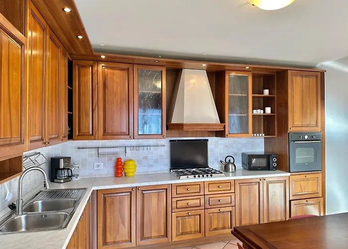 Casa Monte Lago Апартаменты Донго